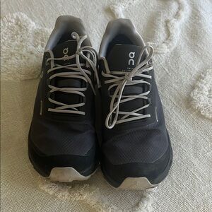 On Running Black and White Athletic Shoes Sleek Design